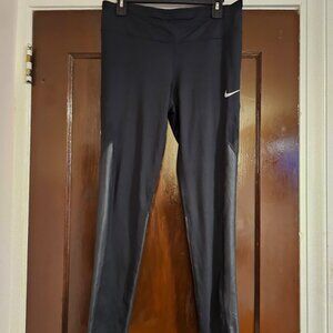 Nike Women's Faux Leather / Mesh Leggings